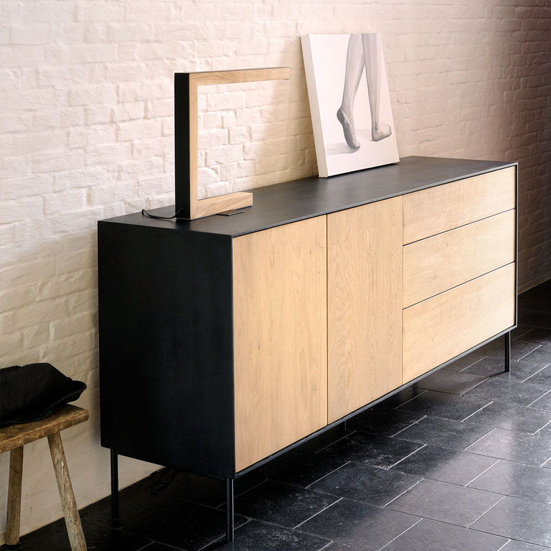 Blackbird Sideboard Lifeshot 02 Olson and Baker - Designer & Contemporary Sofas, Furniture - Olson and Baker showcases original designs from authentic, designer brands. Buy contemporary furniture, lighting, storage, sofas & chairs at Olson + Baker.