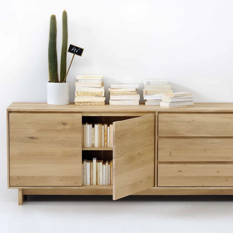 Ethnicraft Wave Sideboard by Constance Guisset Oak Lifeshot 01 Olson and Baker - Designer & Contemporary Sofas, Furniture - Olson and Baker showcases original designs from authentic, designer brands. Buy contemporary furniture, lighting, storage, sofas & chairs at Olson + Baker.