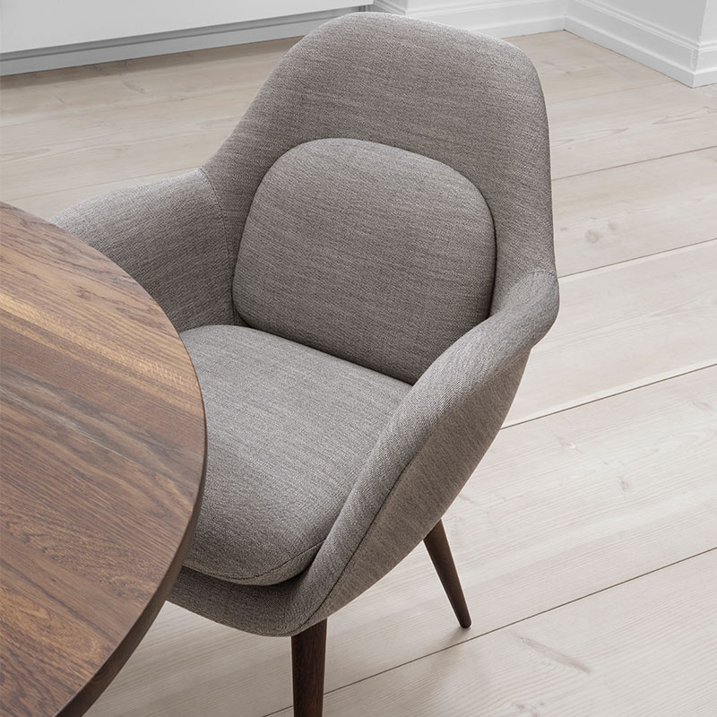 Fredericia Swoon Dining Chair Lifeshot 02 Olson and Baker - Designer & Contemporary Sofas, Furniture - Olson and Baker showcases original designs from authentic, designer brands. Buy contemporary furniture, lighting, storage, sofas & chairs at Olson + Baker.