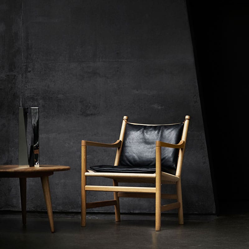 Carl Hansen CH44 Lounge Chair by Hans Wegner life 2 Olson and Baker - Designer & Contemporary Sofas, Furniture - Olson and Baker showcases original designs from authentic, designer brands. Buy contemporary furniture, lighting, storage, sofas & chairs at Olson + Baker.