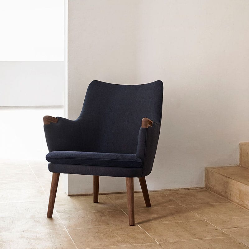 Carl Hansen CH71 Lounge Chair by Hans Wegner life 3) Olson and Baker - Designer & Contemporary Sofas, Furniture - Olson and Baker showcases original designs from authentic, designer brands. Buy contemporary furniture, lighting, storage, sofas & chairs at Olson + Baker.