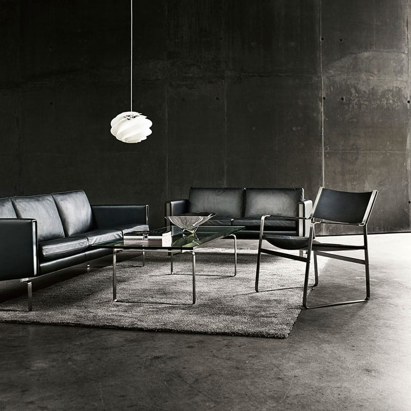 Carl Hansen CH102 Lounge Chair by Hans Wegner Thor 301 leather life 1 Olson and Baker - Designer & Contemporary Sofas, Furniture - Olson and Baker showcases original designs from authentic, designer brands. Buy contemporary furniture, lighting, storage, sofas & chairs at Olson + Baker.