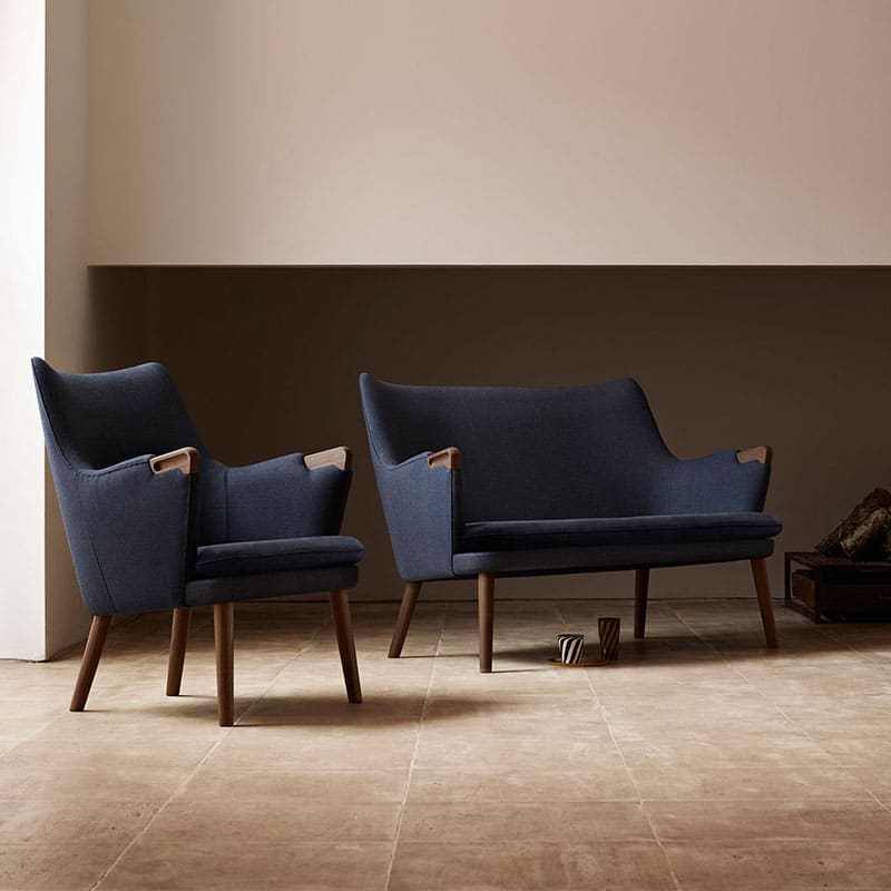 Carl Hansen CH72 Two Seat Sofa by Hans Wegner life 1 Olson and Baker - Designer & Contemporary Sofas, Furniture - Olson and Baker showcases original designs from authentic, designer brands. Buy contemporary furniture, lighting, storage, sofas & chairs at Olson + Baker.