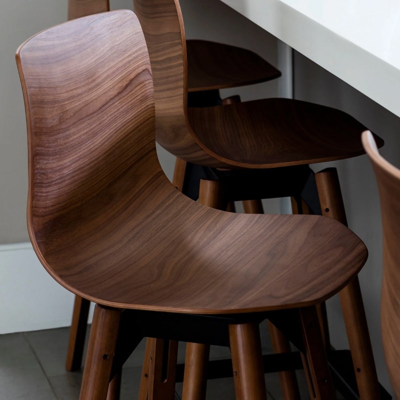 Case Furniture - Loku Stool by Shin Azumi - Walnut - Lifeshot 02 Olson and Baker - Designer & Contemporary Sofas, Furniture - Olson and Baker showcases original designs from authentic, designer brands. Buy contemporary furniture, lighting, storage, sofas & chairs at Olson + Baker.