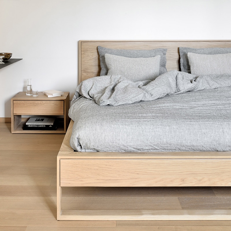 Ethnicraft Nordic II Bed by Alain van Havre Oak Lifeshot 01 Olson and Baker - Designer & Contemporary Sofas, Furniture - Olson and Baker showcases original designs from authentic, designer brands. Buy contemporary furniture, lighting, storage, sofas & chairs at Olson + Baker.