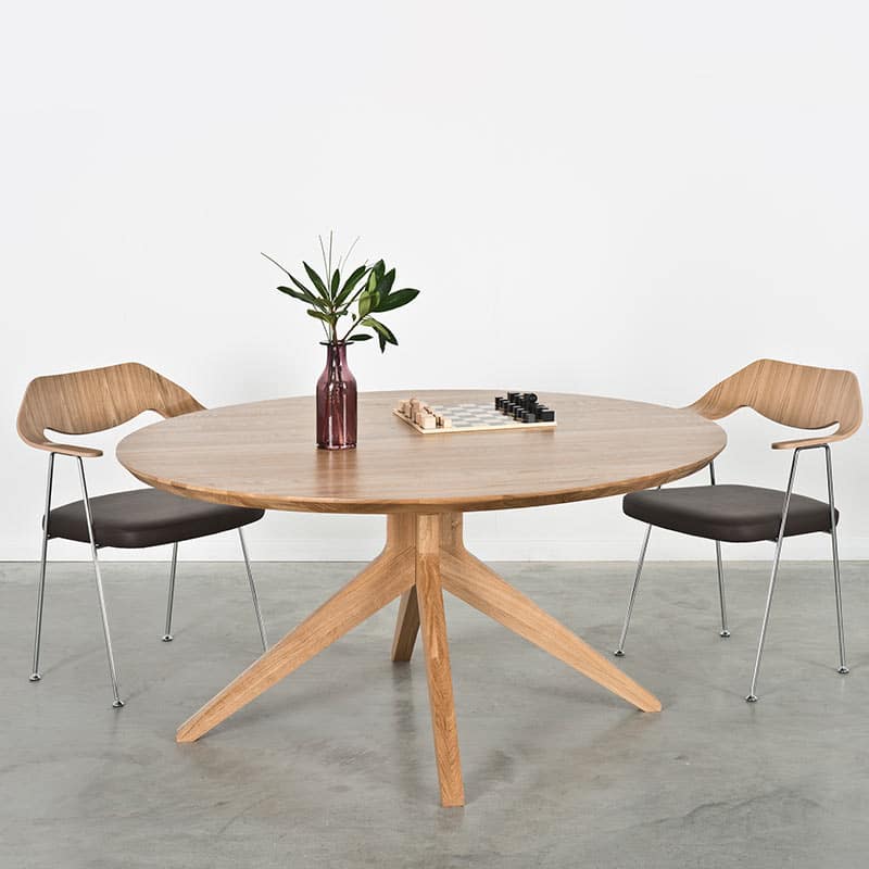 Case-Furniture-–-Cross-Round-150cm-Table-in-Oak-lifestyle Olson and Baker - Designer & Contemporary Sofas, Furniture - Olson and Baker showcases original designs from authentic, designer brands. Buy contemporary furniture, lighting, storage, sofas & chairs at Olson + Baker.