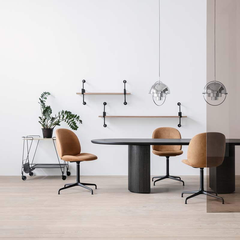 Gubi - Beetle Meeting Chair - Lifestyle 01 Olson and Baker - Designer & Contemporary Sofas, Furniture - Olson and Baker showcases original designs from authentic, designer brands. Buy contemporary furniture, lighting, storage, sofas & chairs at Olson + Baker.
