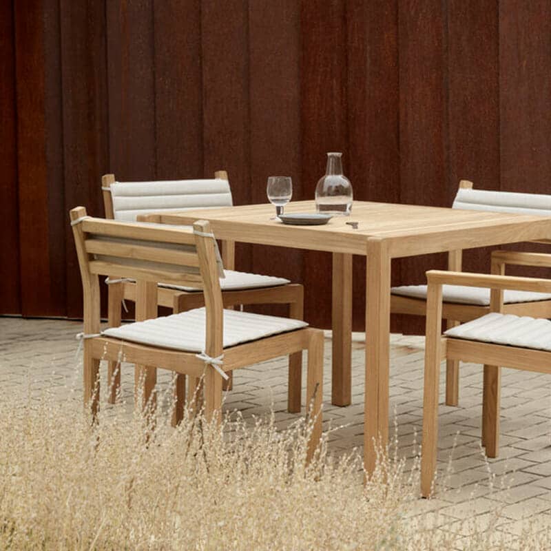 Carl Hansen - AH501 Outdoor Dining Chair - Lifestyle Image 02 Olson and Baker - Designer & Contemporary Sofas, Furniture - Olson and Baker showcases original designs from authentic, designer brands. Buy contemporary furniture, lighting, storage, sofas & chairs at Olson + Baker.