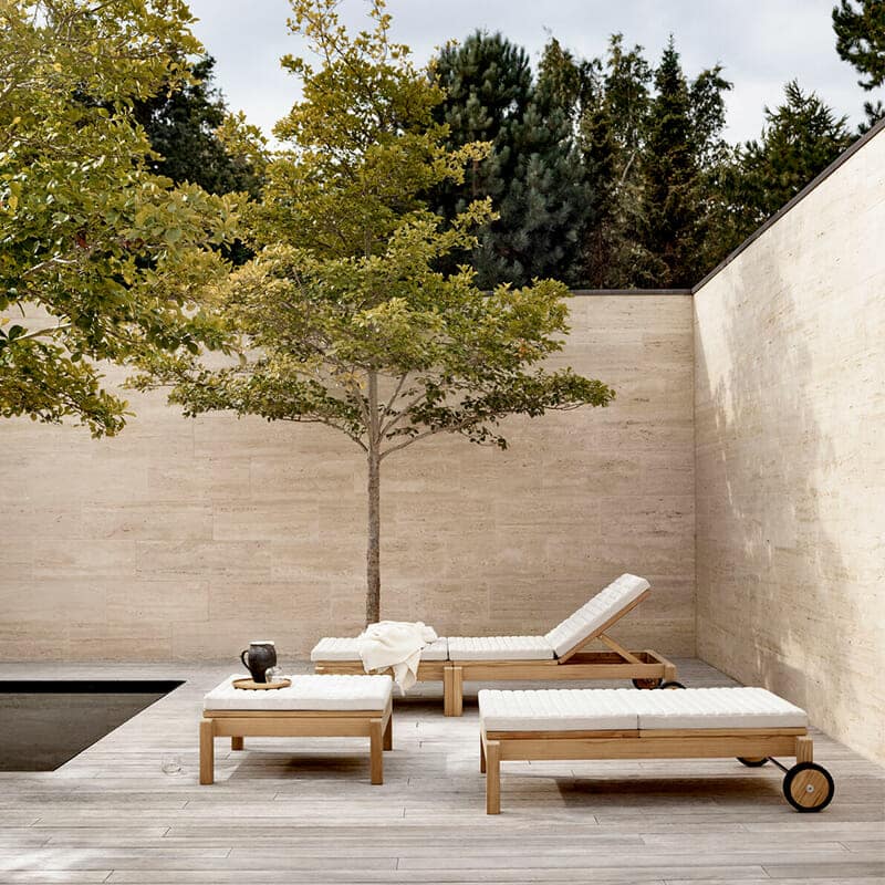 Carl Hansen - AH604 Outdoor Lounger - Lifestyle Image 01 Olson and Baker - Designer & Contemporary Sofas, Furniture - Olson and Baker showcases original designs from authentic, designer brands. Buy contemporary furniture, lighting, storage, sofas & chairs at Olson + Baker.