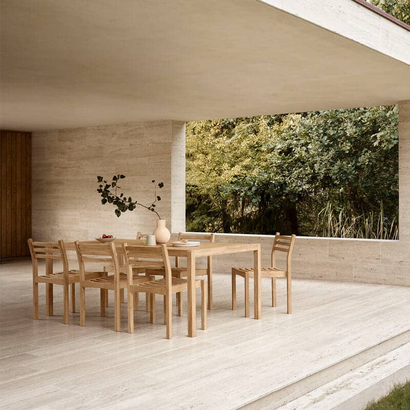 Carl Hansen - AH901 Outdoor Dining Table - Lifestyle Image 01 Olson and Baker - Designer & Contemporary Sofas, Furniture - Olson and Baker showcases original designs from authentic, designer brands. Buy contemporary furniture, lighting, storage, sofas & chairs at Olson + Baker.