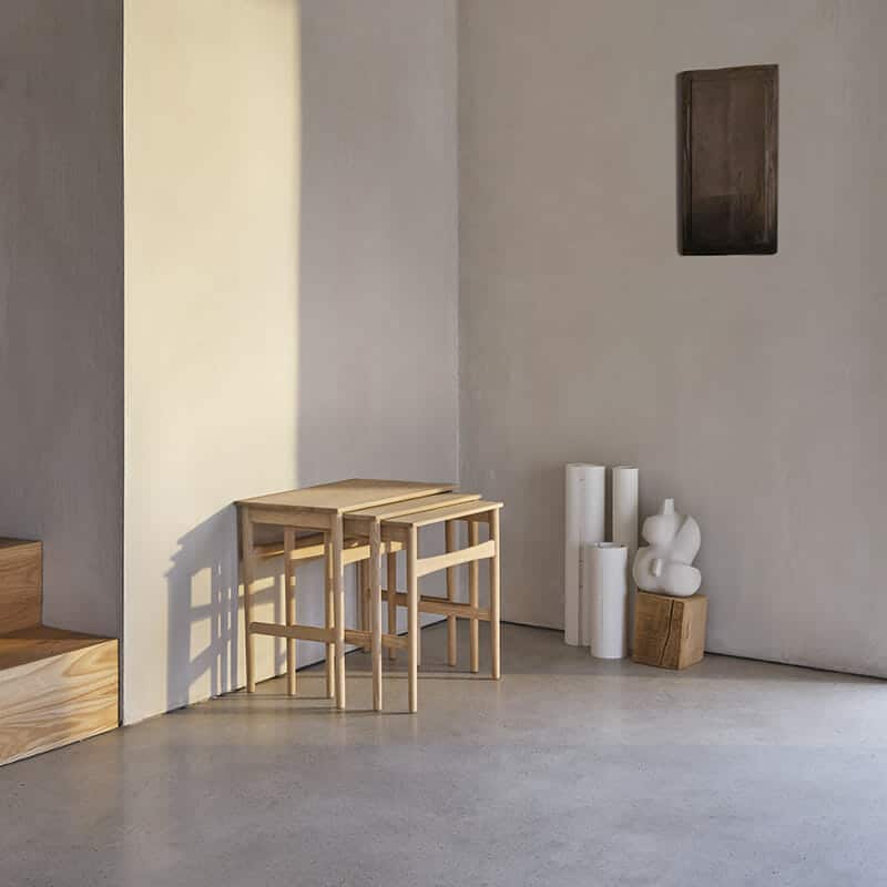 Carl Hansen -CH004 Nesting Tables -Lifestyle Image 01 Olson and Baker - Designer & Contemporary Sofas, Furniture - Olson and Baker showcases original designs from authentic, designer brands. Buy contemporary furniture, lighting, storage, sofas & chairs at Olson + Baker.