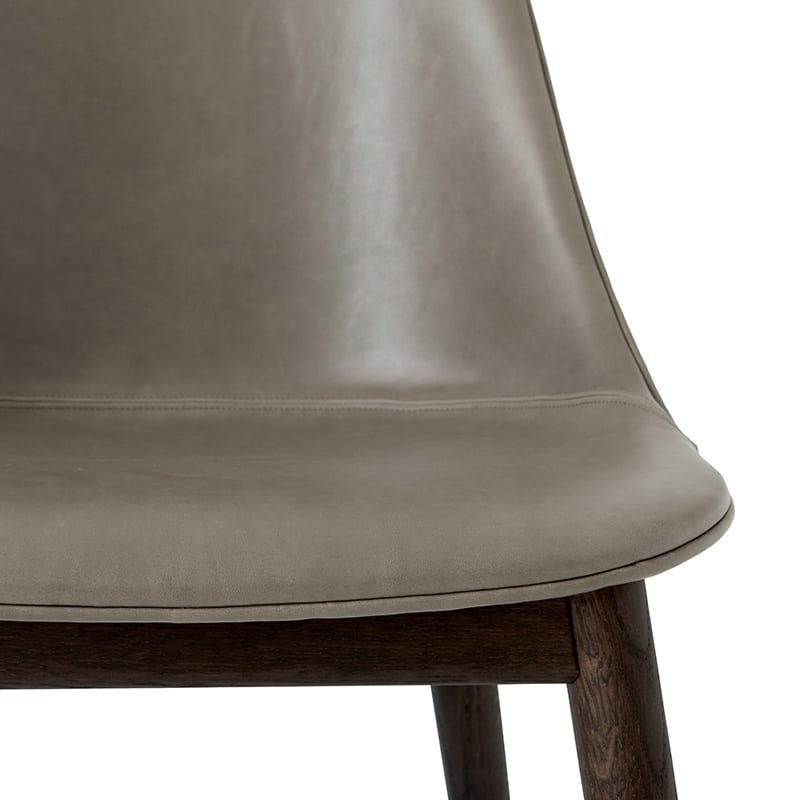 Audo Copenhagen Harbour Chair Fully Upholstered Nevotex - 0311 Antilop Dakar Aniline Leather Dark Stained Oak Detail Image 01 Olson and Baker - Designer & Contemporary Sofas, Furniture - Olson and Baker showcases original designs from authentic, designer brands. Buy contemporary furniture, lighting, storage, sofas & chairs at Olson + Baker.
