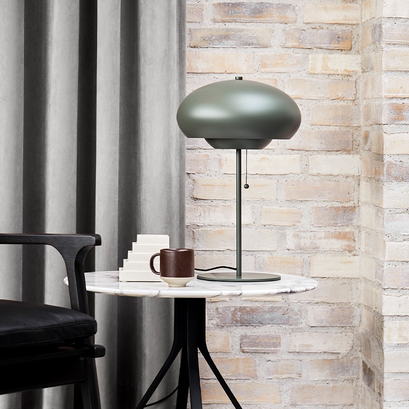 Frandsen - Champ Table Lamp - Lifestyle 000002 Olson and Baker - Designer & Contemporary Sofas, Furniture - Olson and Baker showcases original designs from authentic, designer brands. Buy contemporary furniture, lighting, storage, sofas & chairs at Olson + Baker.