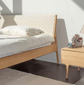 Gazzd Fawn Bed Black Oiled Oak white webbing headboard close up 5 Olson and Baker - Designer & Contemporary Sofas, Furniture - Olson and Baker showcases original designs from authentic, designer brands. Buy contemporary furniture, lighting, storage, sofas & chairs at Olson + Baker.