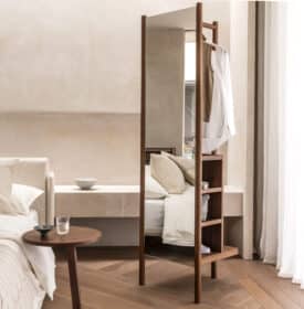 Case Furniture Pala Vanity Mirror Walnut Lifestyle Image 01 Olson and Baker - Designer & Contemporary Sofas, Furniture - Olson and Baker showcases original designs from authentic, designer brands. Buy contemporary furniture, lighting, storage, sofas & chairs at Olson + Baker.